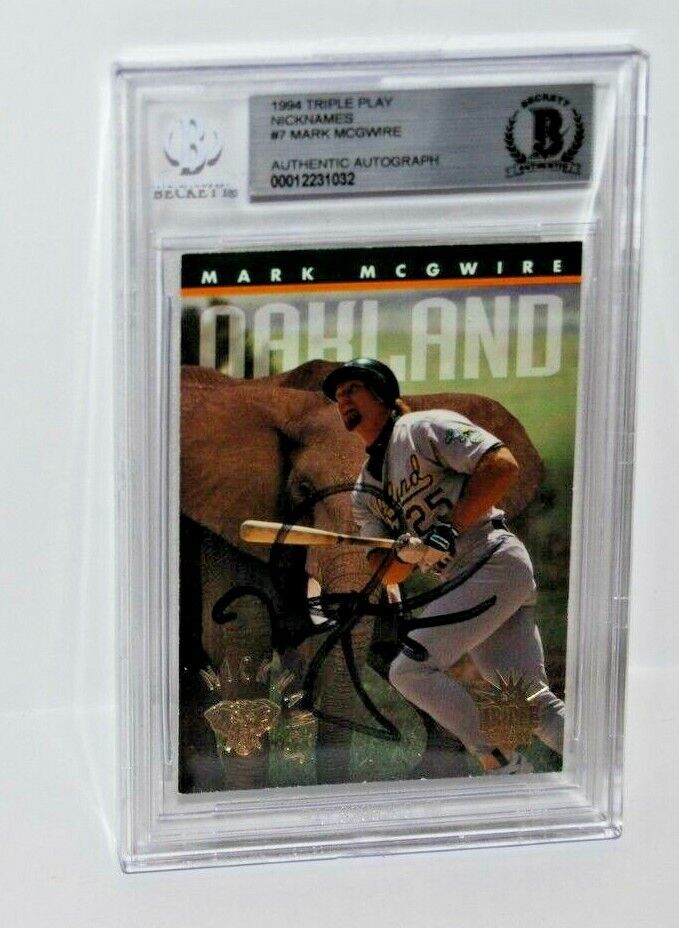 MARK MCGWIRE signed (OAKLAND ATHLETICS) Nick Names baseball card BECKETT BAS