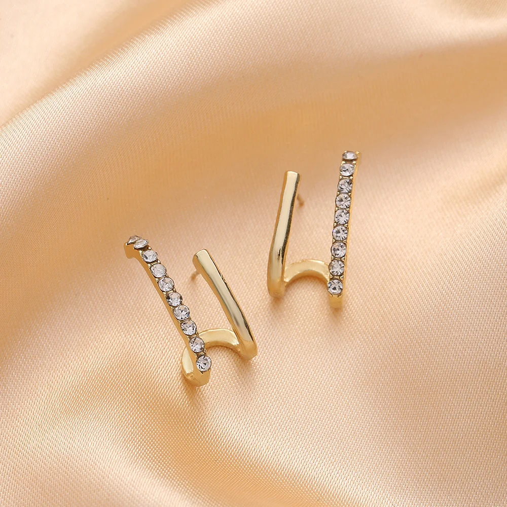 Gold & Crystal Claw Earrings