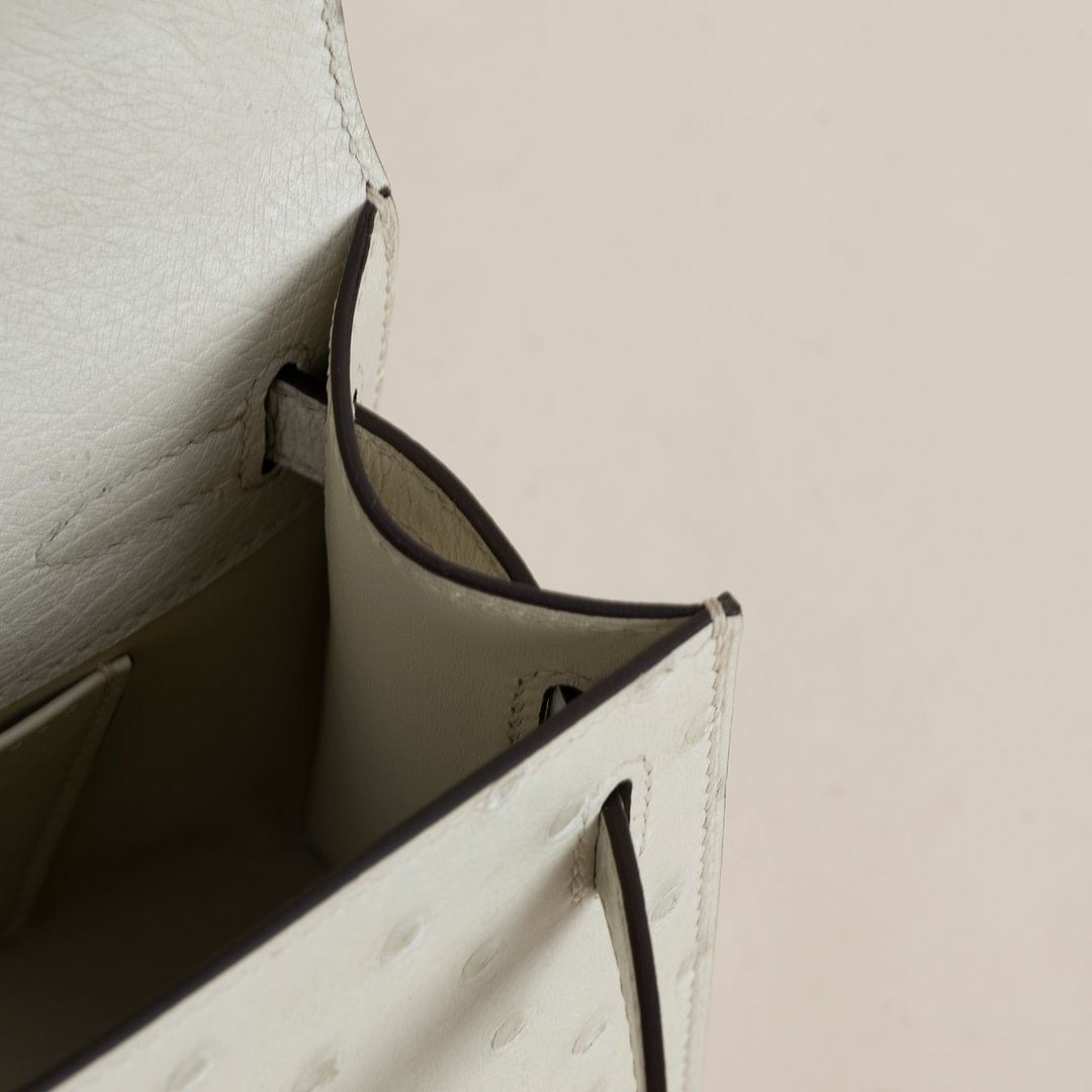 Kelly pochette Ostrich 3C Parchemin GHW