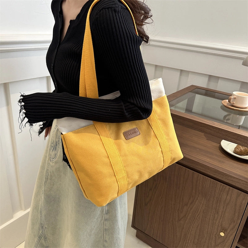 New Spring New Xiaoqing New Wide Shoulder Strap Handbag Casual Beautiful Shoulder Bag Large Capacity Women’s Bag