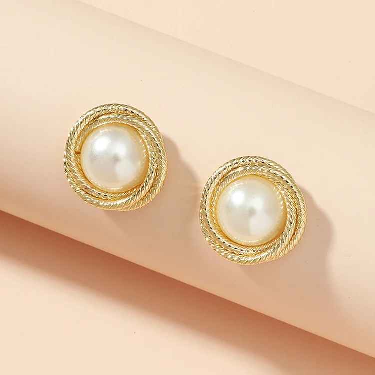 atmospheric twisted baroque pearl aloof earrings