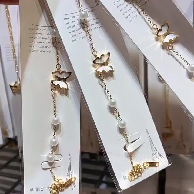 Butterfly and pearl bracelet