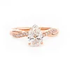 14K Rose Gold 1.5ct Pear Cut Lab Diamond Twist Pave Ring