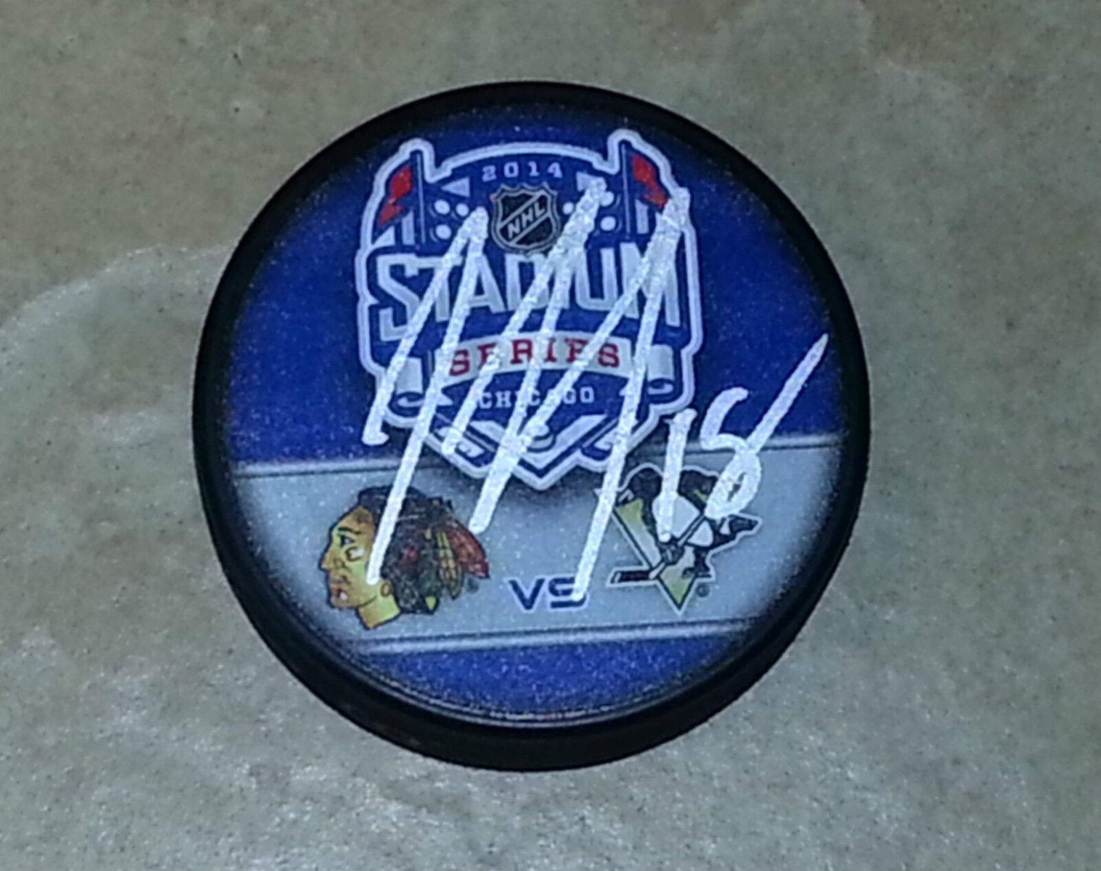 JAMES NEAL 'PITTSBURGH PENGUINS' SIGNED 2014 STADIUM SERIES PUCK *COA