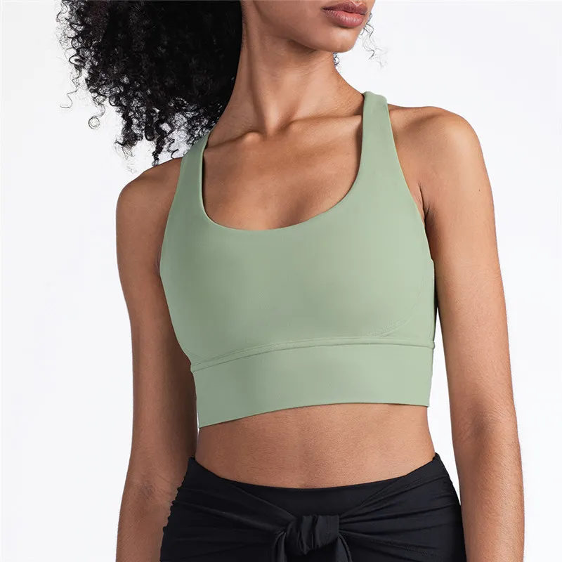 green sports bra with built in cups