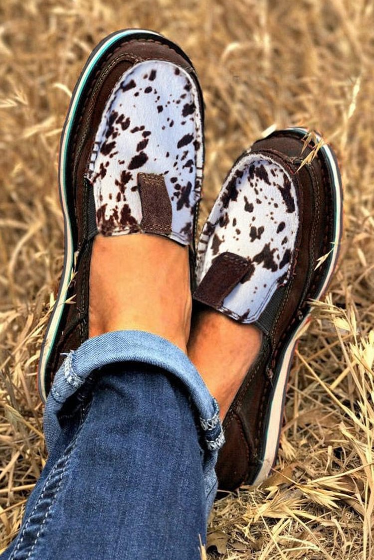 COW PRINT SLIP ON FLAT LOAFERS