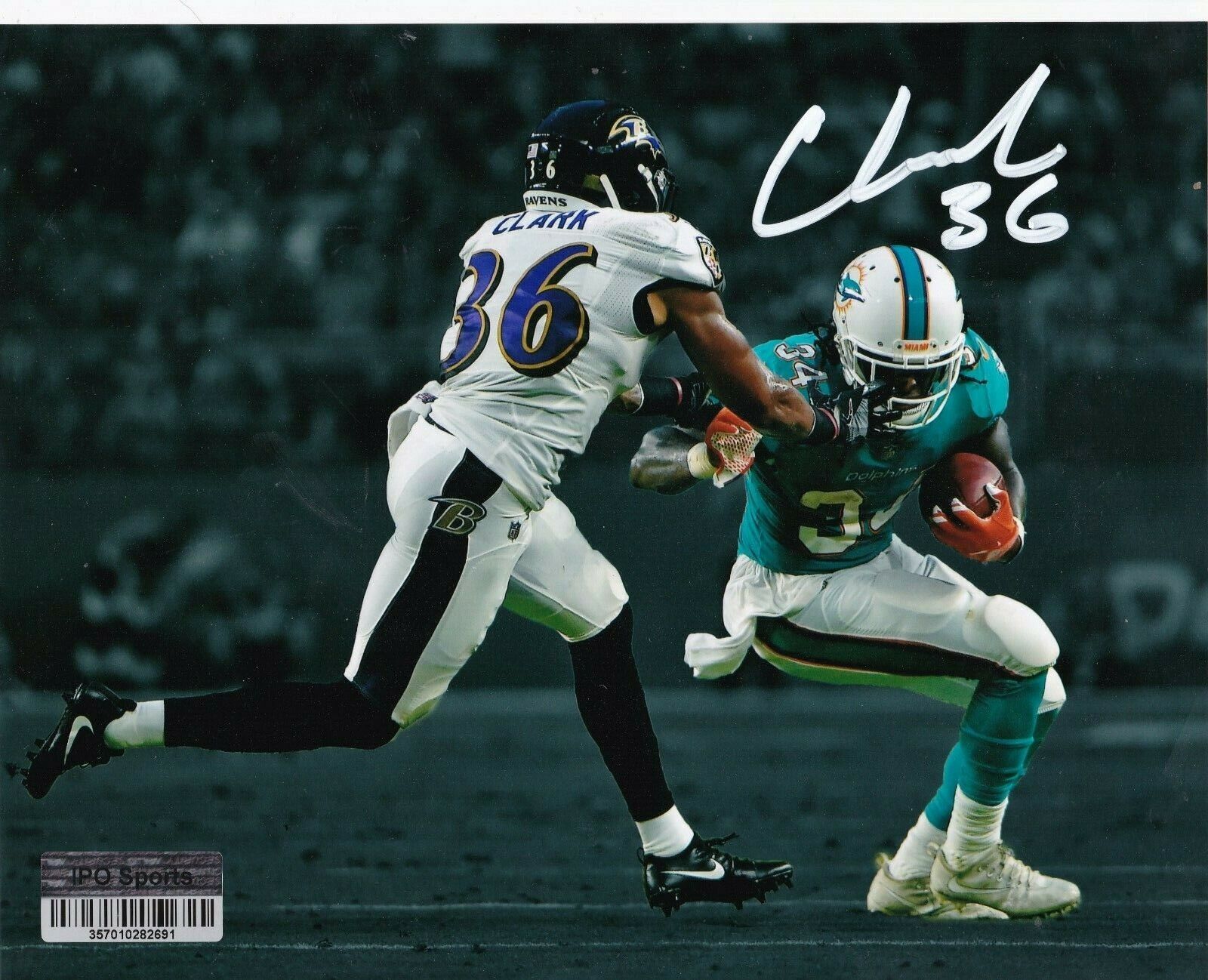 CHUCK CLARK BALTIMORE RAVENS ACTION SIGNED 8X10