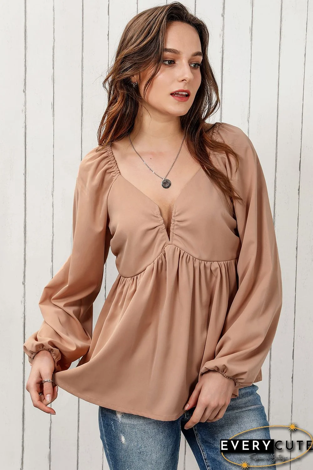 Orange Notched V-Neck Smocked Back Peplum Blouse