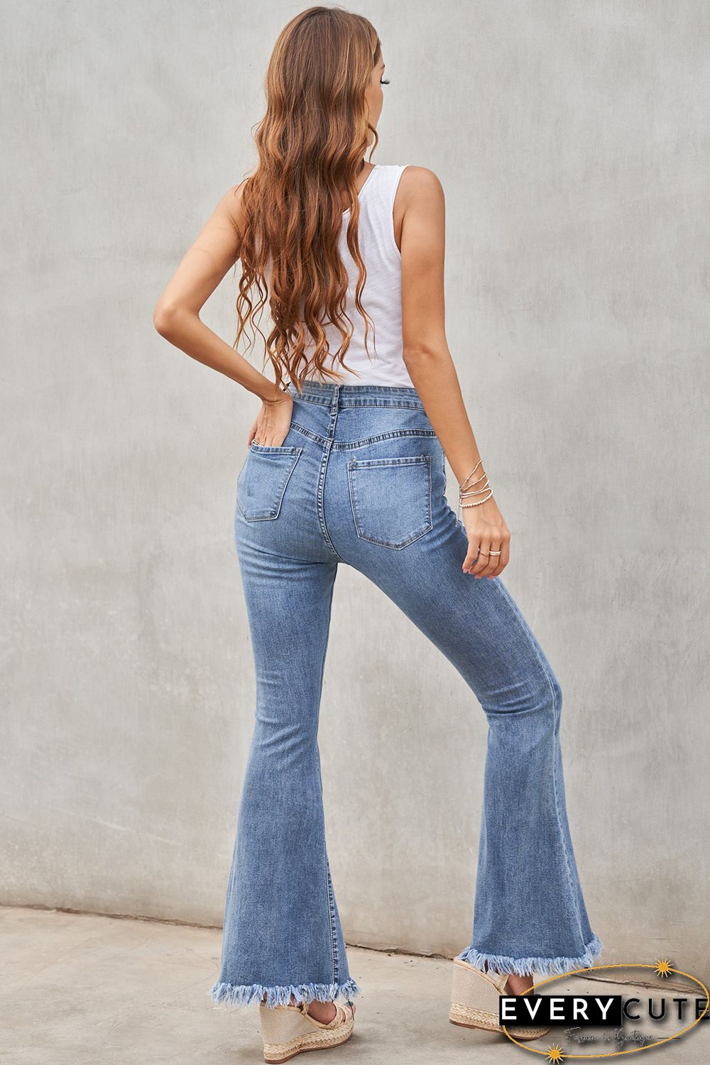 Medium Washed High Waist Flare Jeans with Raw Edges