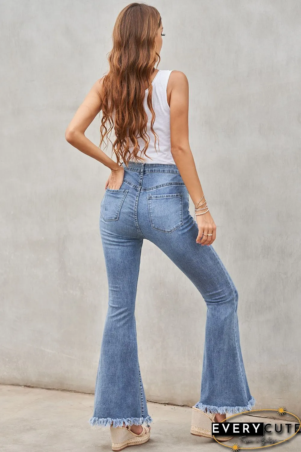 Medium Washed High Waist Flare Jeans with Raw Edges