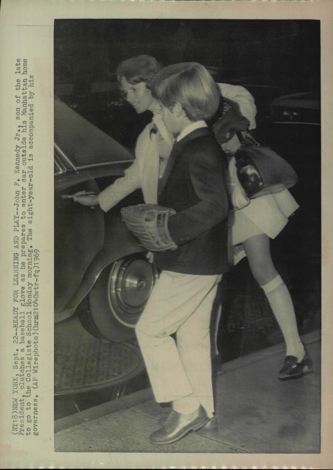 John Kennedy Jr. 1969 Press Photo Poster painting with governess & baseball glove