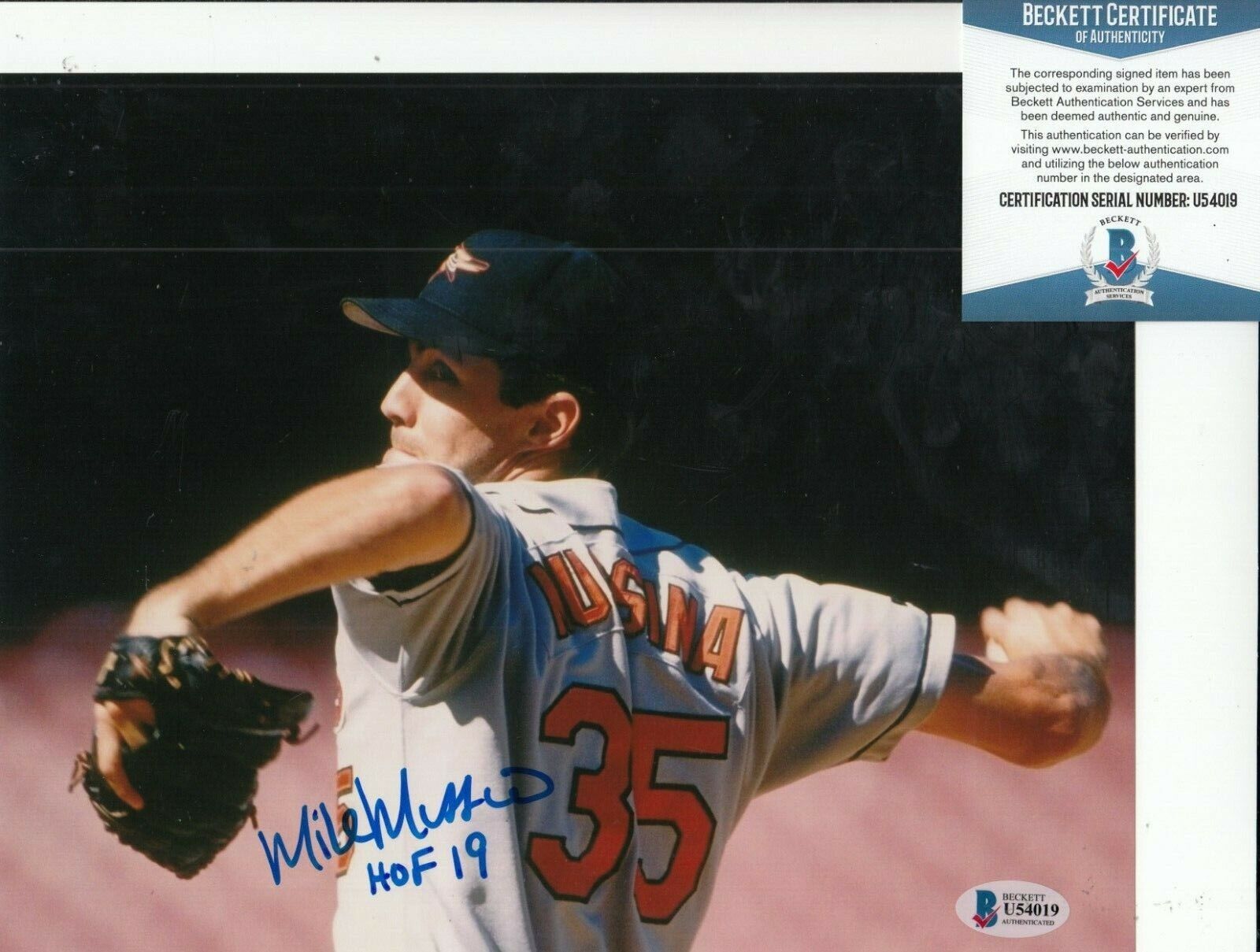 MIKE MUSSINA signed (BALTIMORE ORIOLES) Baseball 8X10 Photo Poster painting BECKETT BAS U54019