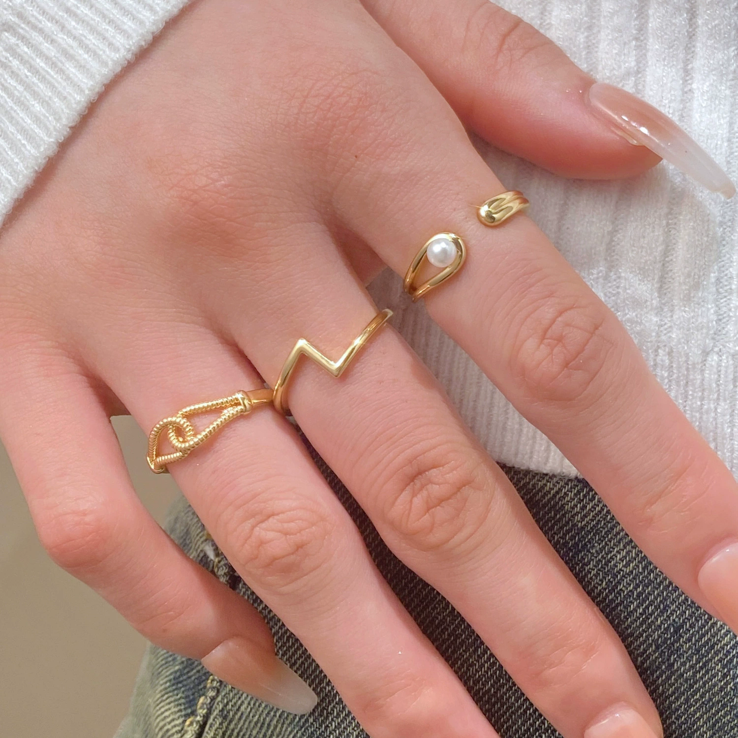 Geometric twisted pearl gold plated ring