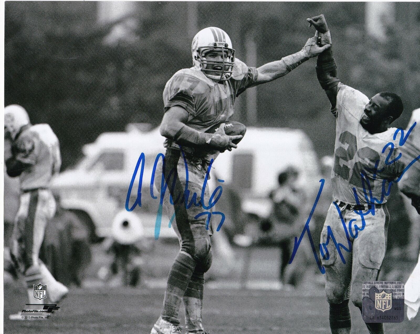 A.J. DUHE / TONY NATHAN MIAMI DOLPHINS ACTION SIGNED 8x10