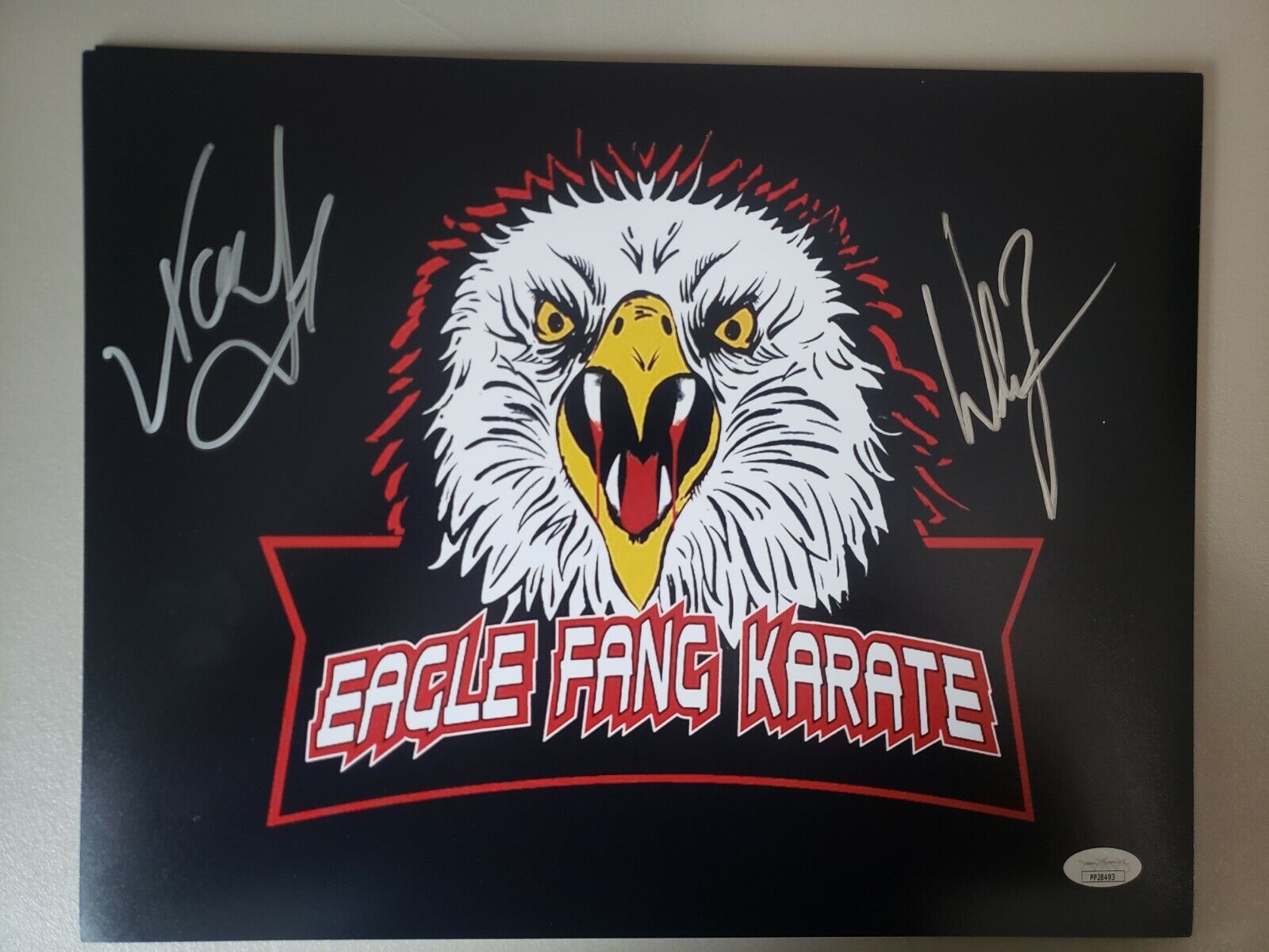 11x14 Auto'ed by William Zabka and Xolo Maridue?a in Cobra Kai Eagle Fang. JSA