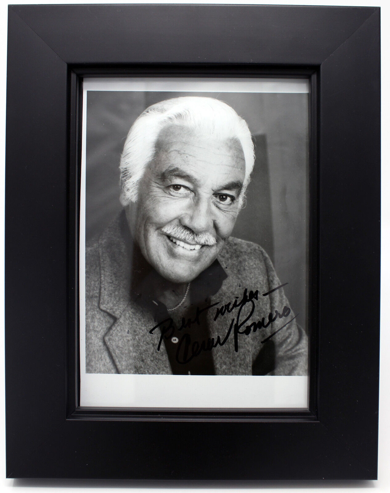 The JOKER:CESAR ROMERO (DECEASED) SIGNED 5X7 FRAMED JSA AUTHENTICATED COA N45522