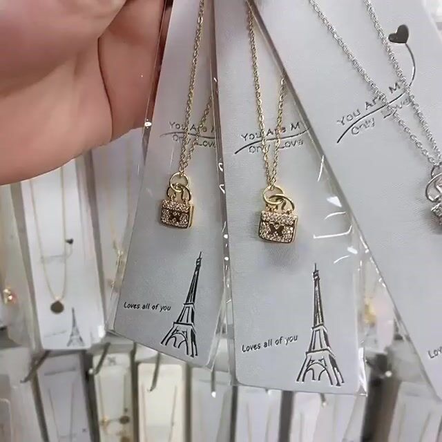 Handbag shaped zirconia gold plated necklace