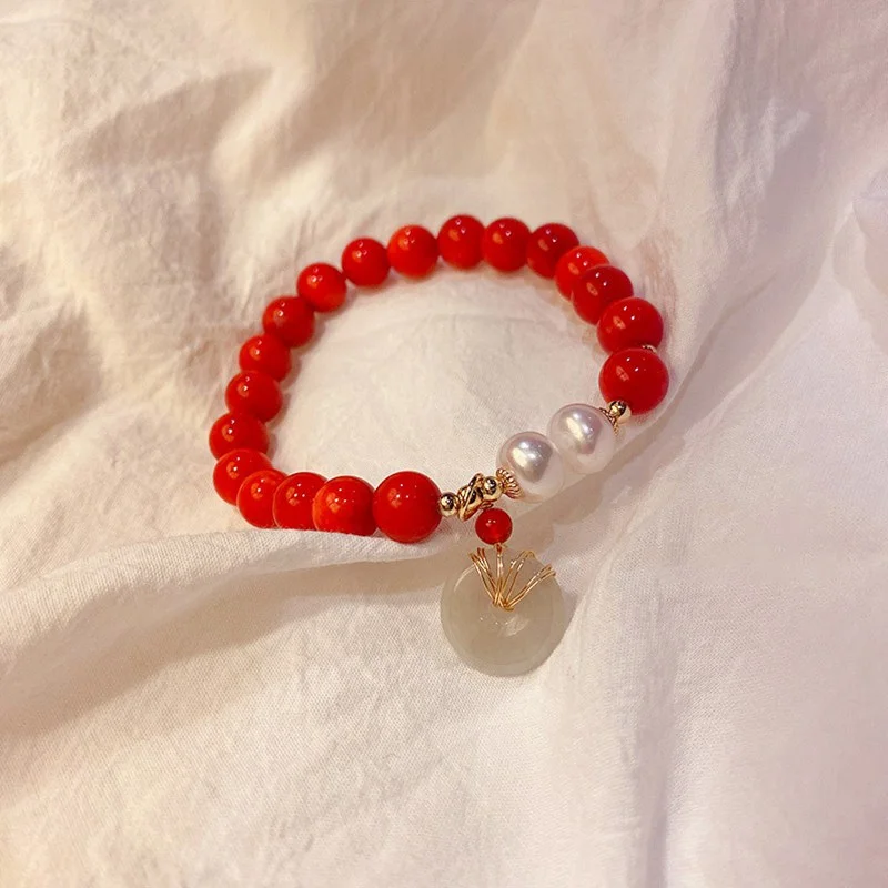 Natural Red Chalcedony and Freshwater Pearl Beaded Bracelet with Lucky Fashion Jade Pendant: A Fine Ethnic Style New Year's Accessory, featuring a Jade Bracelet