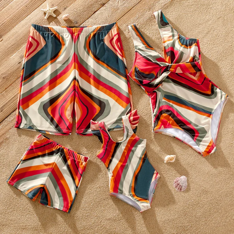 Family Matching Allover Geo Print Twist Front Deep V Neck One-piece Swimsuit or Swim Trunks Shorts
