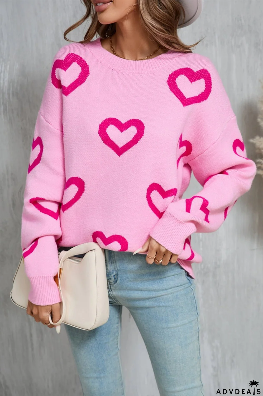 Heart-shaped, long-sleeved sweater with a crew neck and dropped shoulders