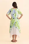 Back view of women's double-layer resort dress with layered handkerchief hem