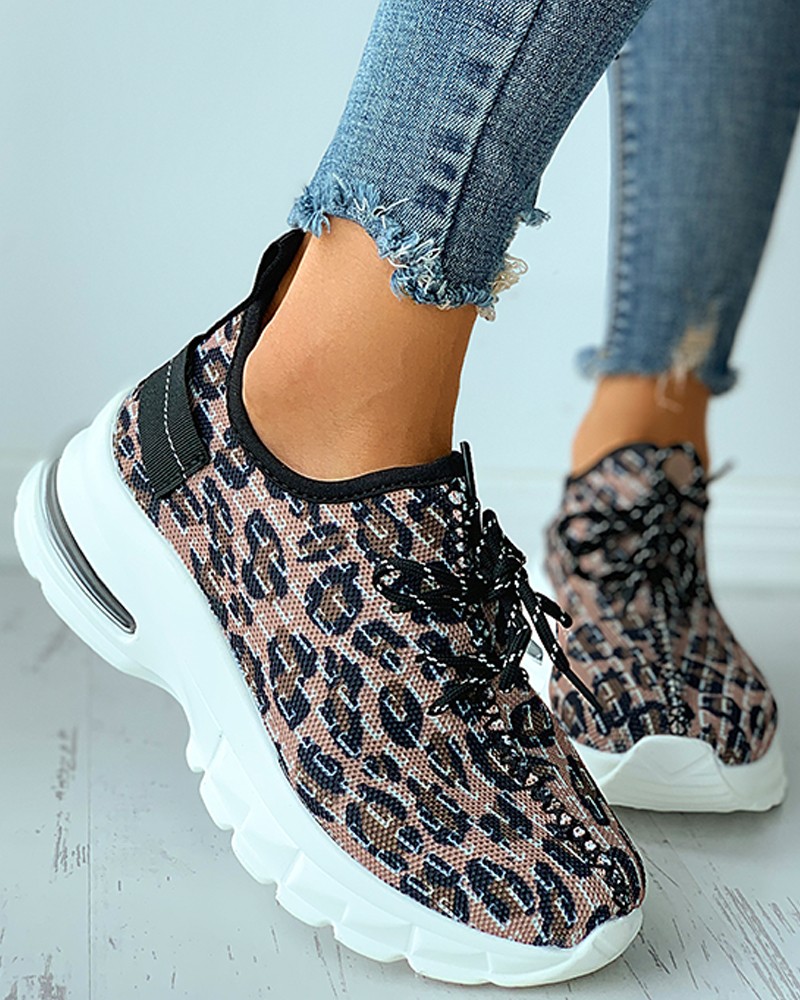 white sneakers with cheetah print back