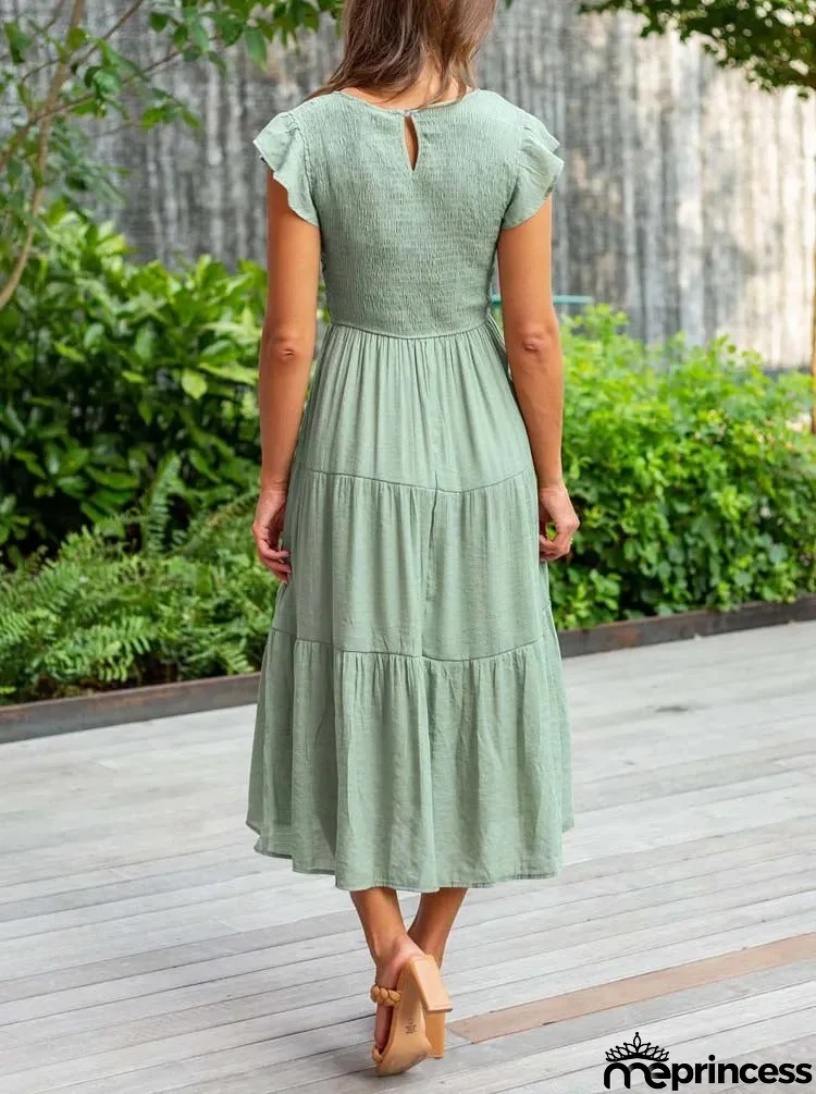 Elegant summer dress: ruffle details, pockets