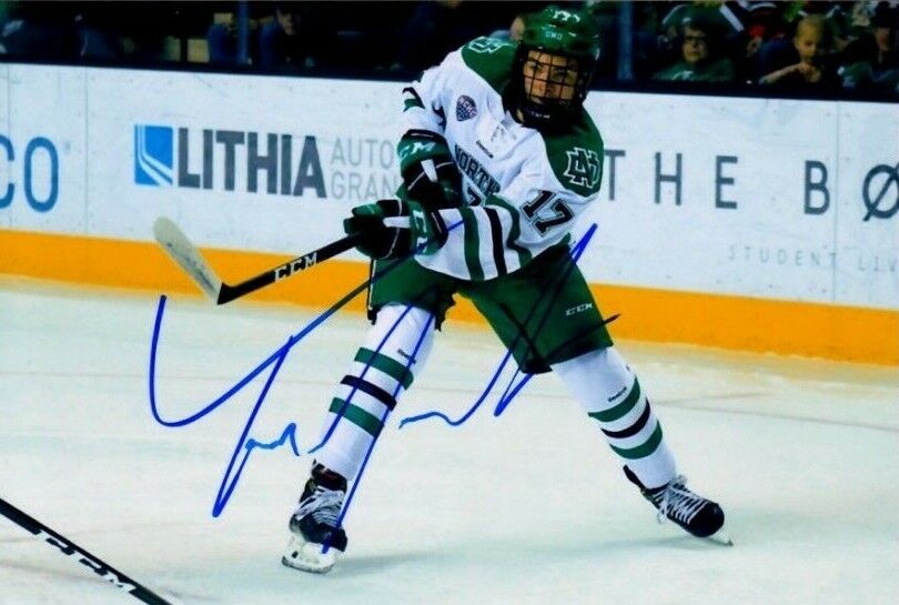 TYSON JOST autographed SIGNED NORTH DAKOTA FIGHTING HAWKS SIOUX 4X6 Photo Poster painting