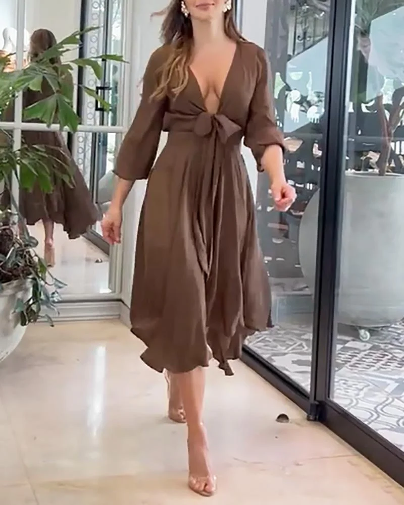 A-line dress with deep V neck and high waist