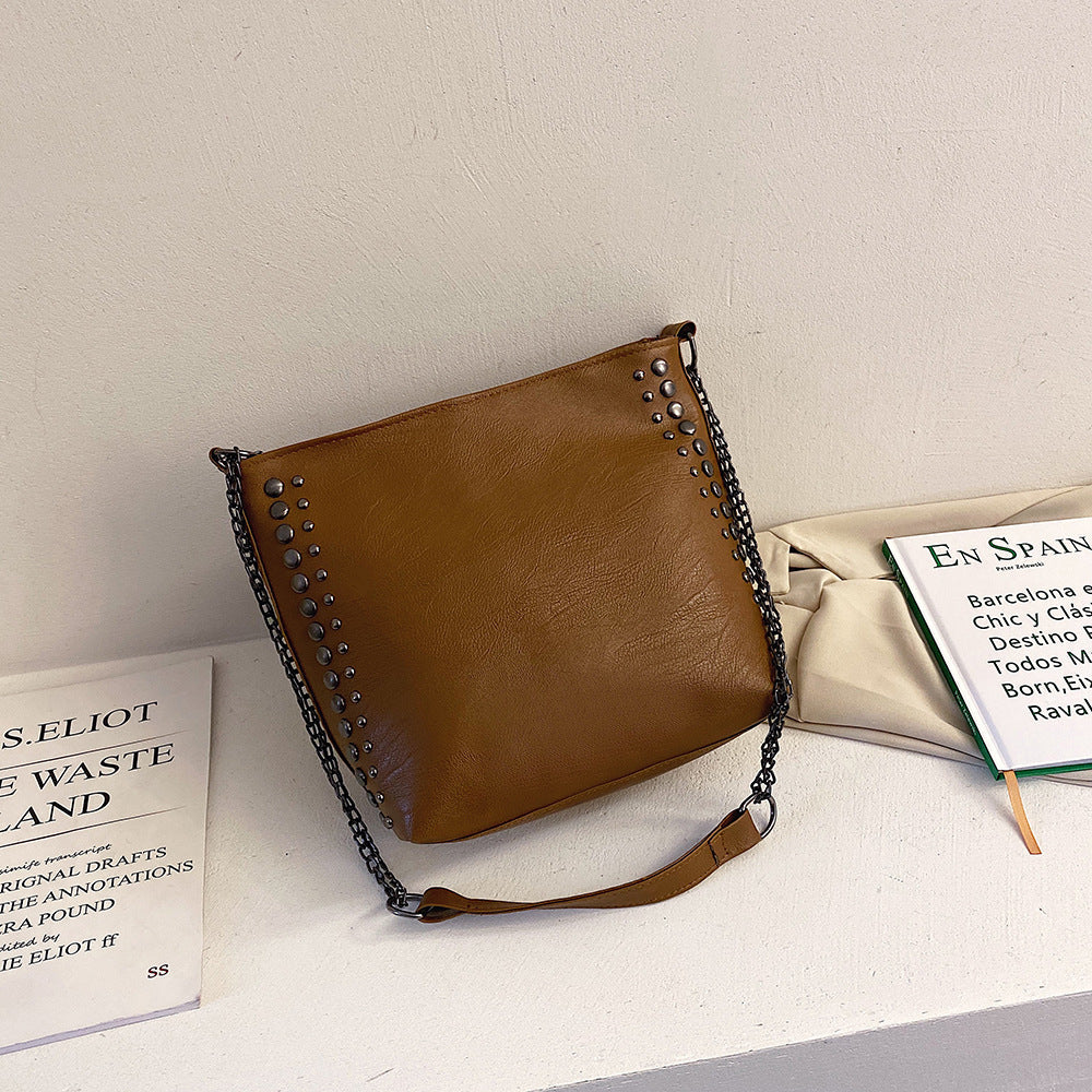Winter new female bag retro style large capacity one-shoulder bucket bag soft leather rivet messenger bag