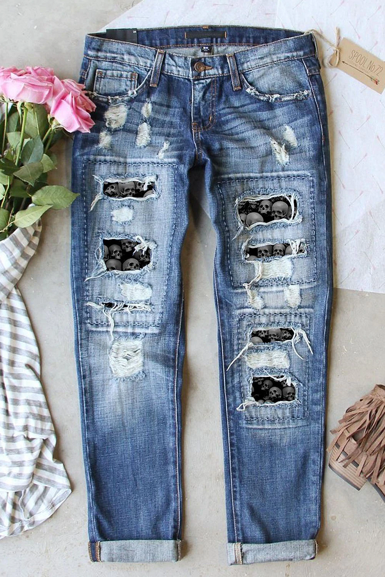 BLACK SKULL RIPPED JEANS