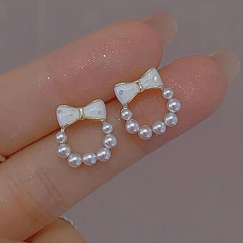 1 Pair Elegant Minimalist Streetwear Flower Bow Knot Plating Inlay Alloy Artificial Pearls Zircon Ear Studs
