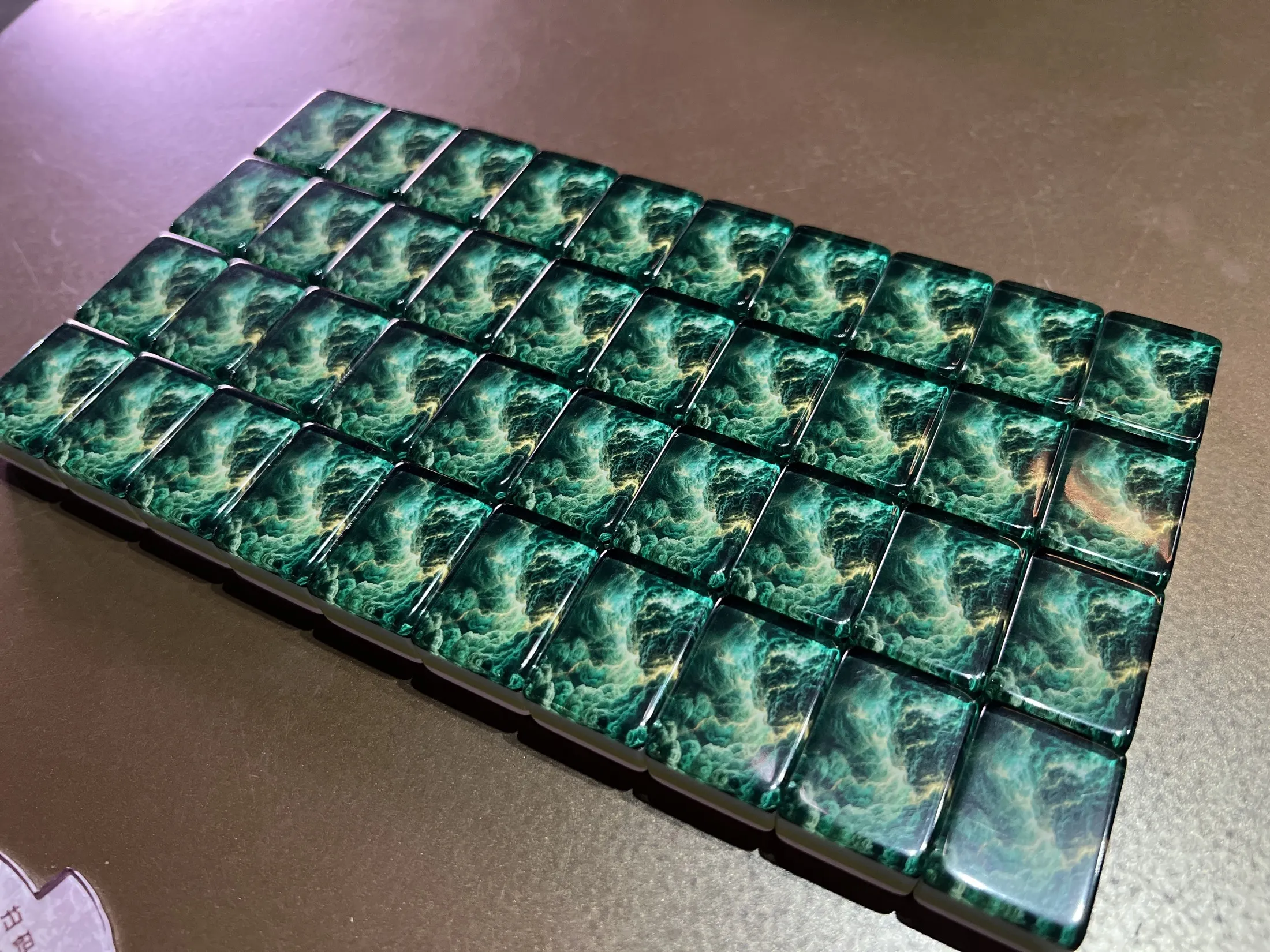 Real tiles showing the dramatic backs and readable faces.