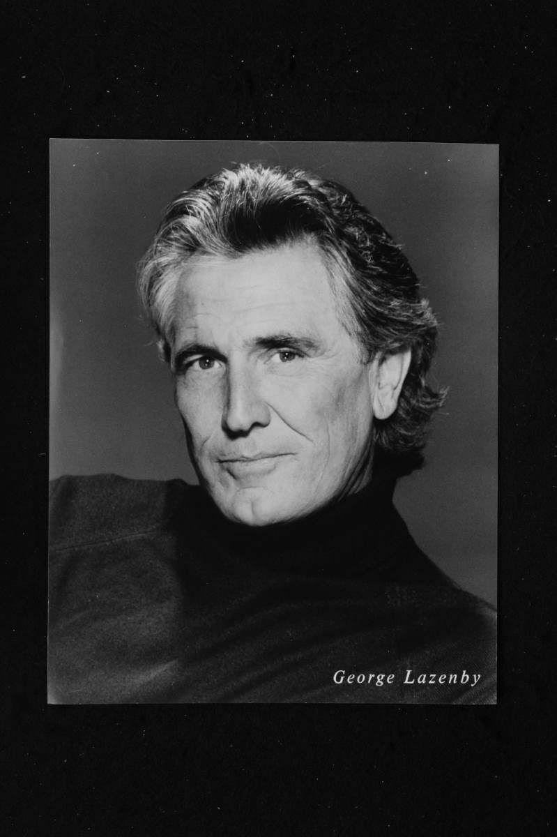 George Lazenby - 8x10 Photo Poster painting w/ Resume - Majestys Secret Service - James Bond