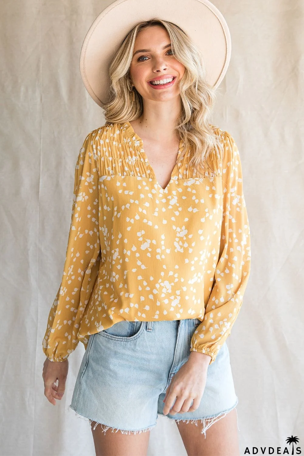 Printed Notched Neck Smocked Blouse