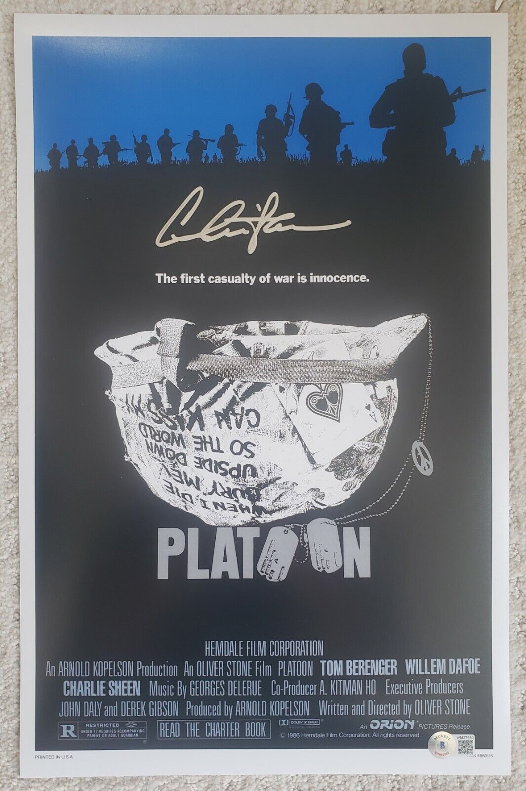 11x17 Autographed poster by Charlie Sheen in Platoon. BAS. Beckett