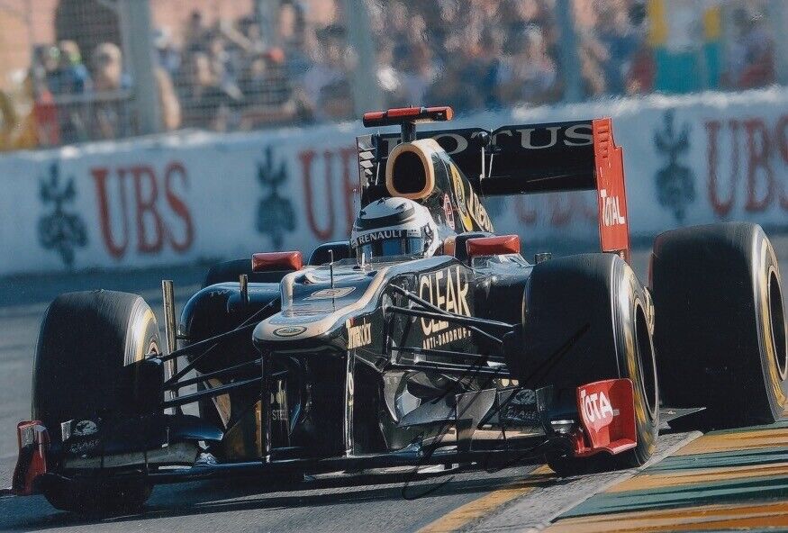 Kimi Raikkonen Hand Signed 12x8 Photo Poster painting F1 Autograph Lotus F1 Team