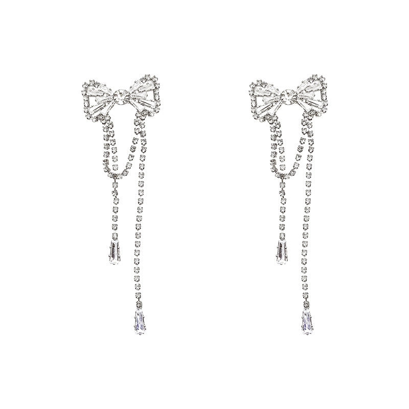 925 Silver Needle High-grade Claw Zirconium Tassel Earrings Women's Light Luxury Niche Temperament Long Earrings Round Face Slimming Earrings