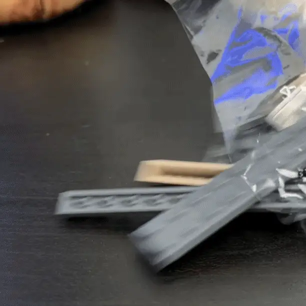 Animated hands-on assembly of building-brick pieces