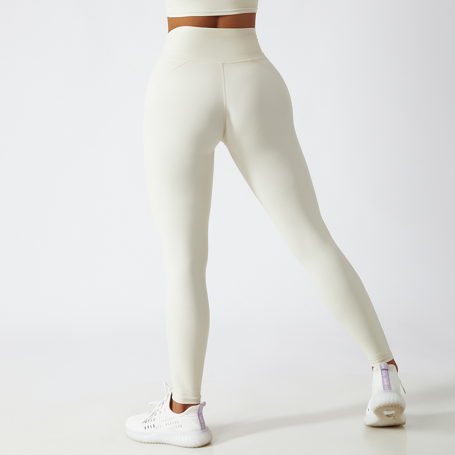 Shop Cream Apricot renewable fabric sustainable no front seam yoga leggings with side pockets online on Hergymclothing