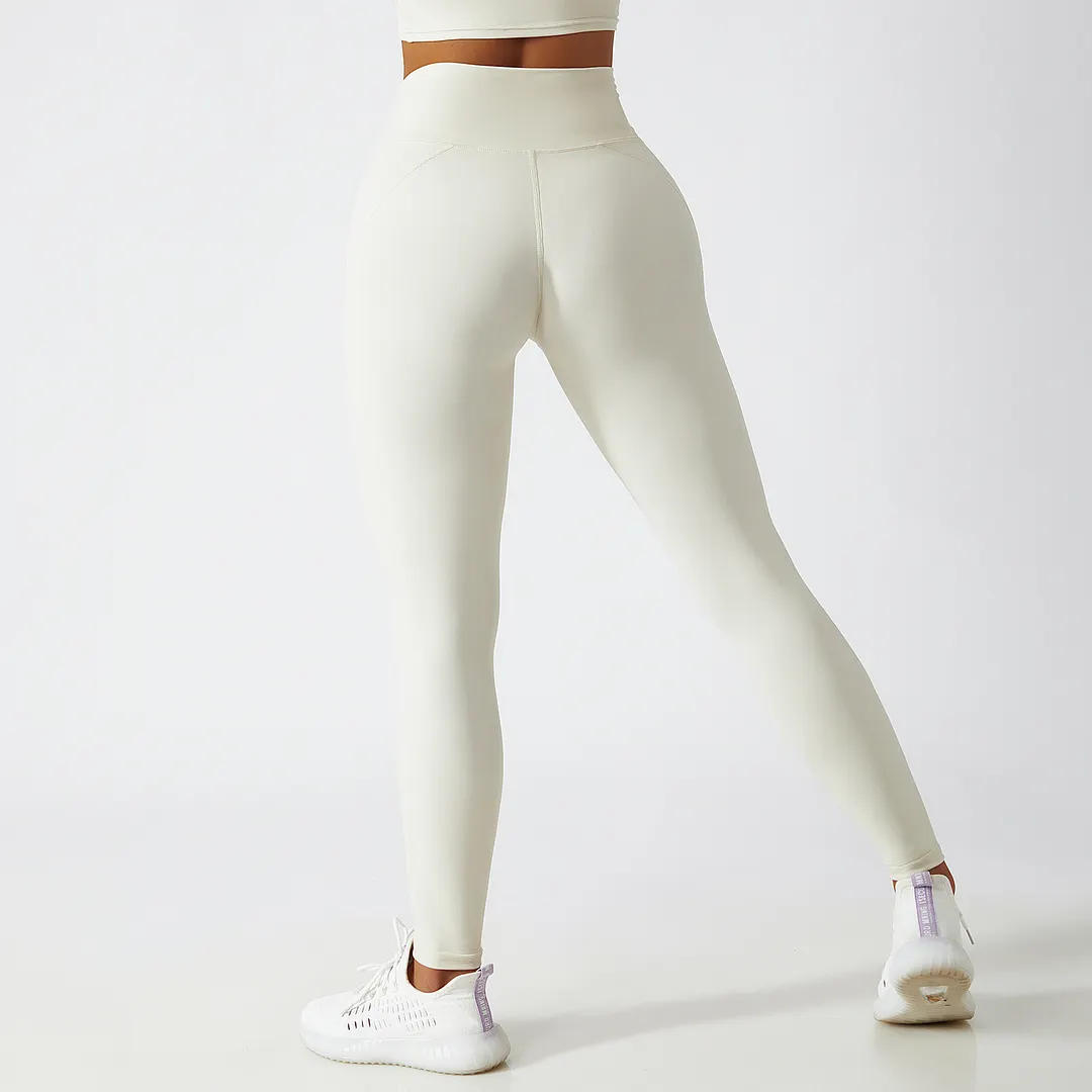 Shop Cream Apricot renewable fabric sustainable no front seam yoga leggings with side pockets online on Hergymclothing