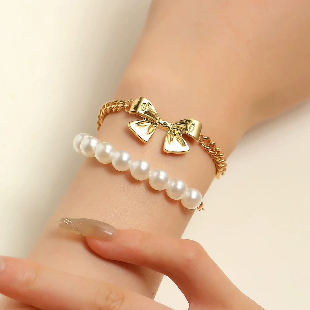 Ribbon pearl two-strand gold-plated bracelet