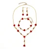 Ensemble de bijoux &eacute;l&eacute;gant avec collier et boucles d'oreilles en forme de fleur de rose