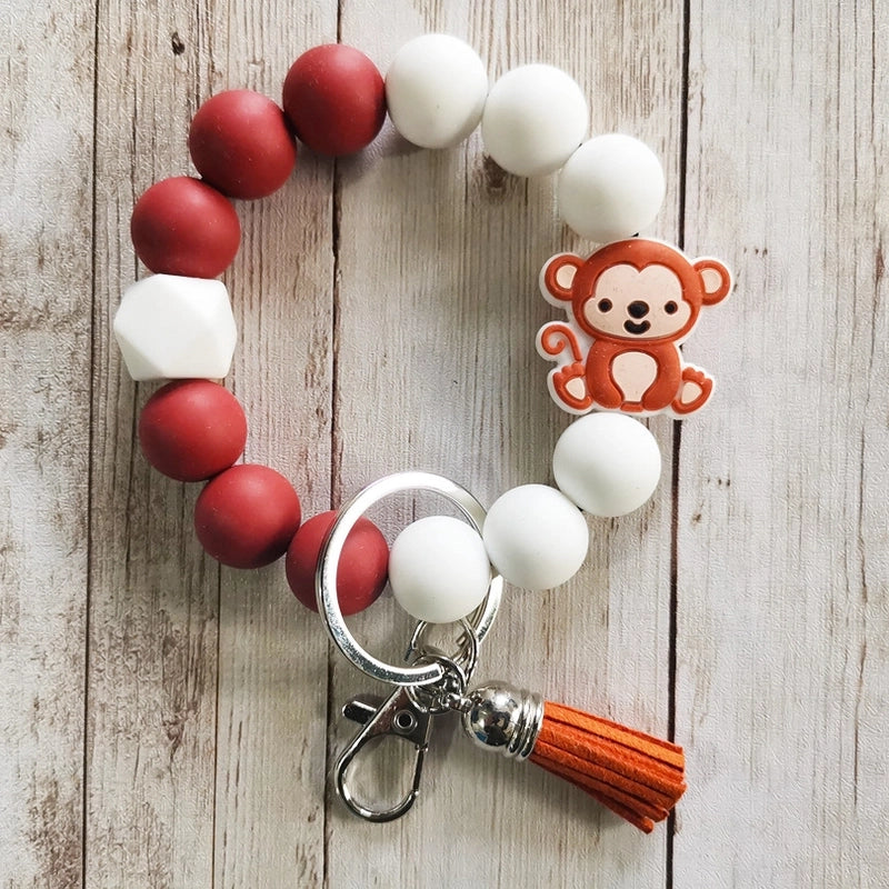 Classic Style Animal Alloy Wooden Beads Silica Gel Bag Pendant Bracelets Keychain