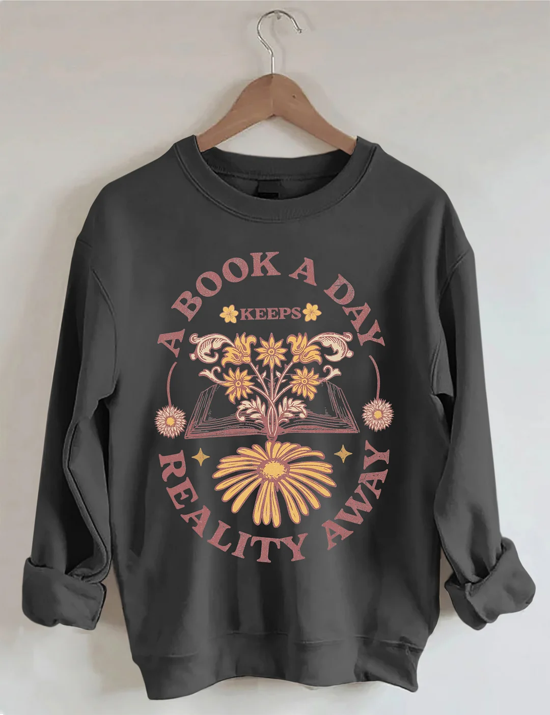 A Book A Day Keeps Reality Away Sweatshirt
