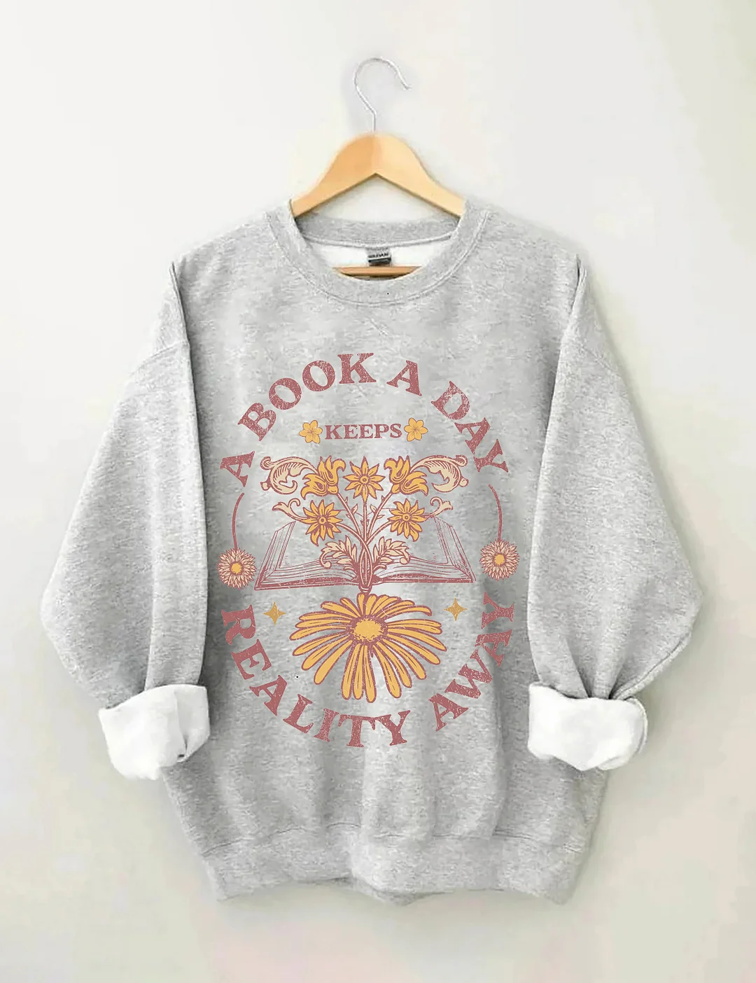 A Book A Day Keeps Reality Away Sweatshirt