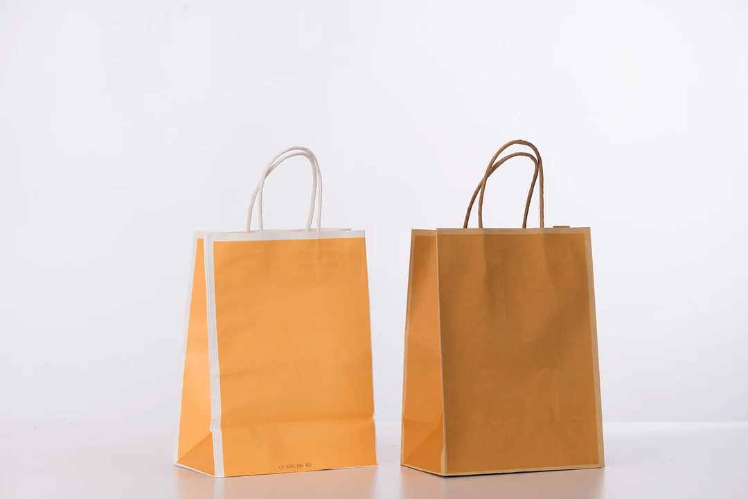Pastel Yellow Paper Gift Bags
