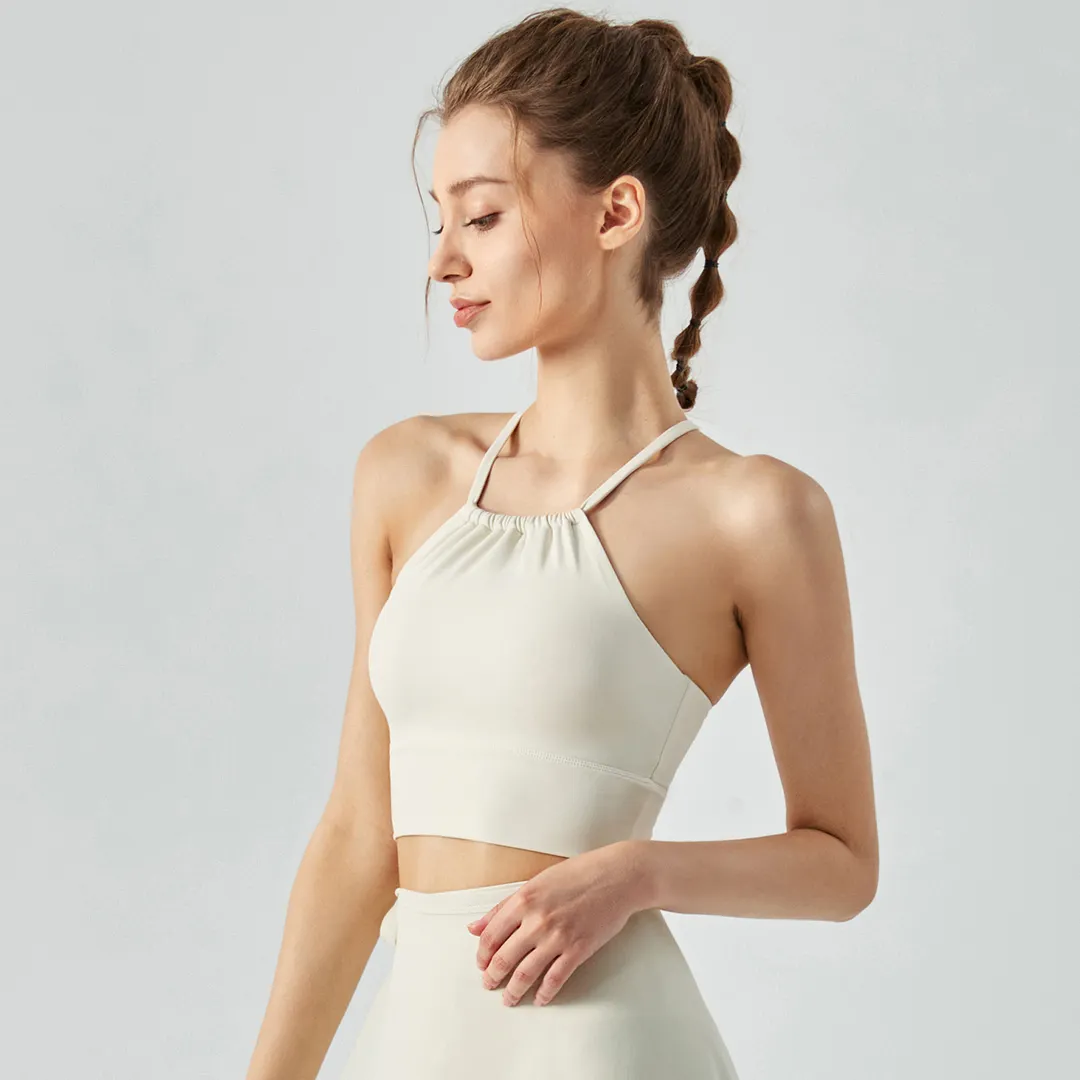 Buy Hergymclothing Ivory White widened hem front collar scrunch padded halter strap cross back sports bra online