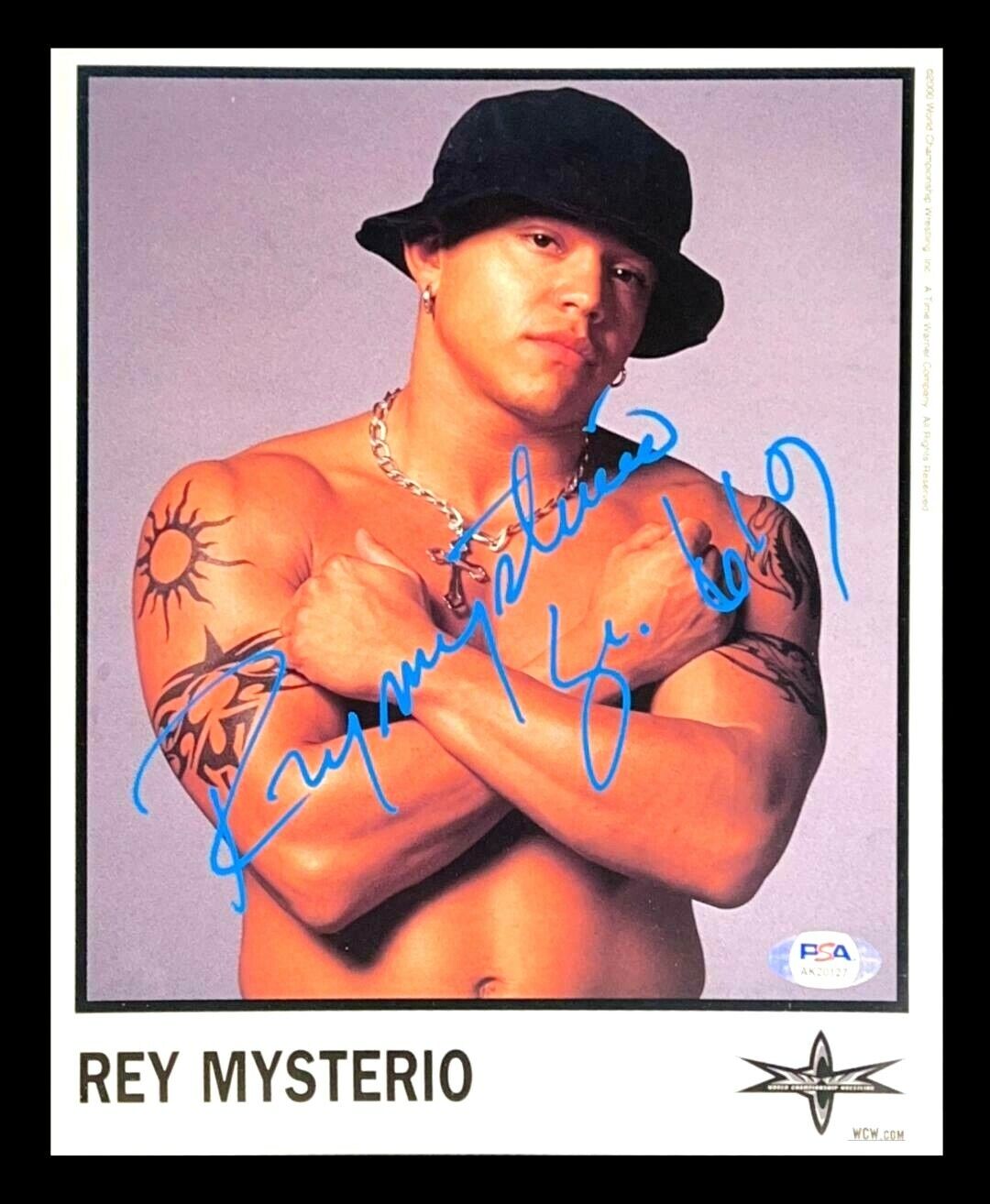 WWE WCW REY MYSTERIO JR HAND SIGNED AUTOGRAPHED 8X10 PROMO Photo Poster painting WITH PSA COA