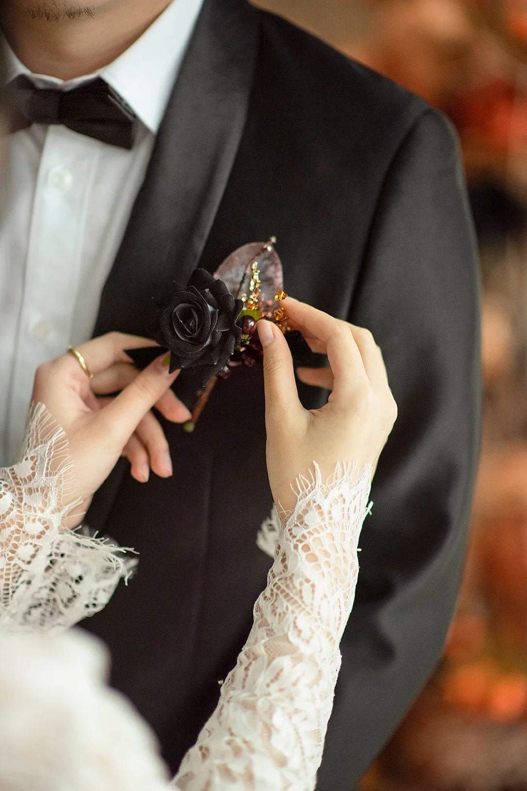 Boutonnieres in Black & Pumpkin Orange